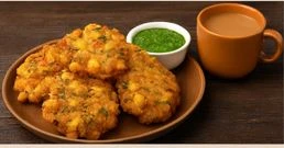 बारिश में बढ़ी मक्का पकोड़े की डिमांड, जानिए घर पर कैसे बनाएं कुरकुरे 'कॉर्न भजिया'