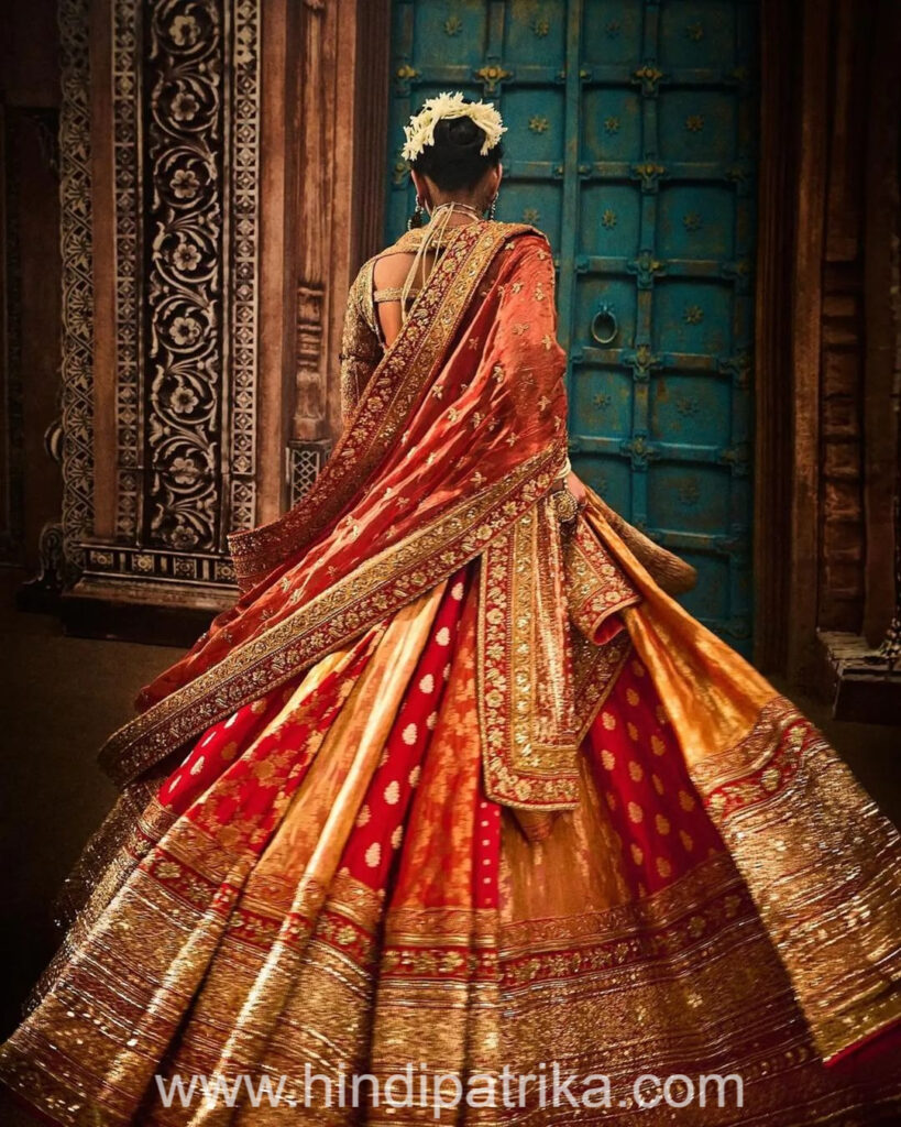 Radhika Merchant's bridal look, Bridal look white and red lehenga with double dupatta (2)