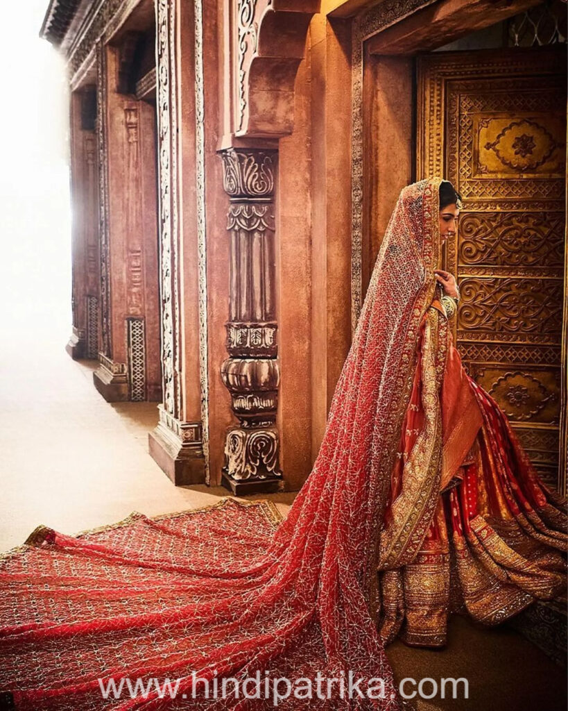 Radhika Merchant's bridal look, Bridal look white and red lehenga with double dupatta (3)