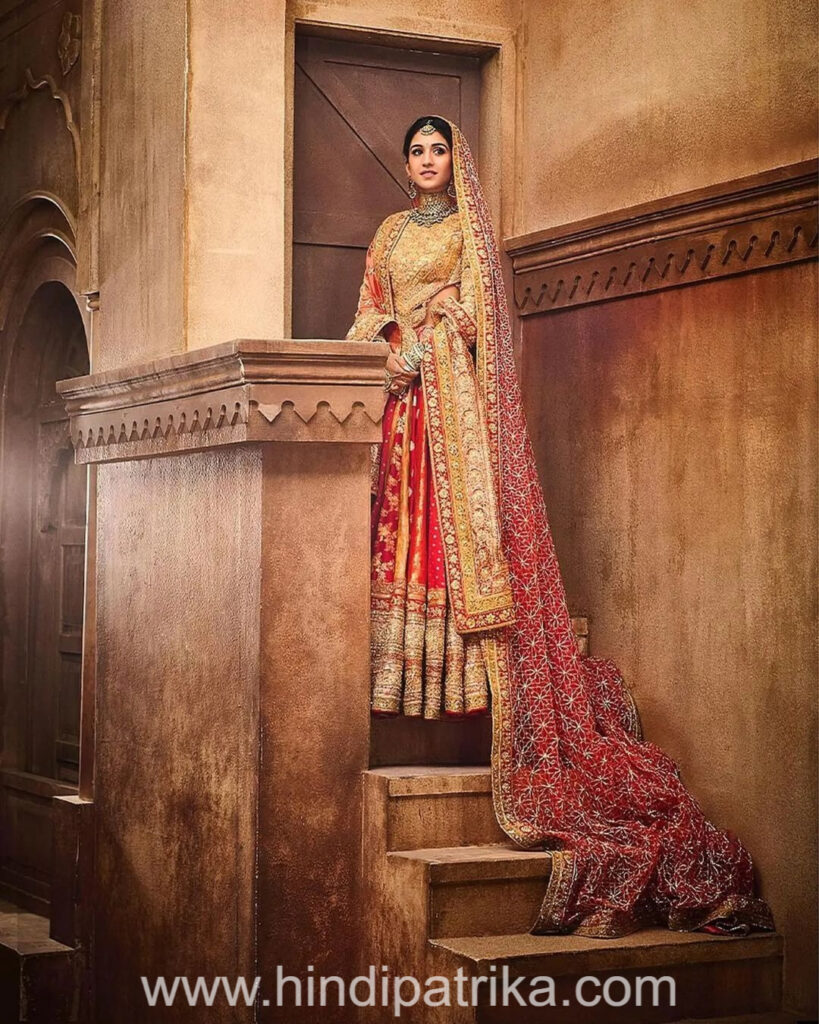 Radhika Merchant's bridal look, Bridal look white and red lehenga with double dupatta (9)